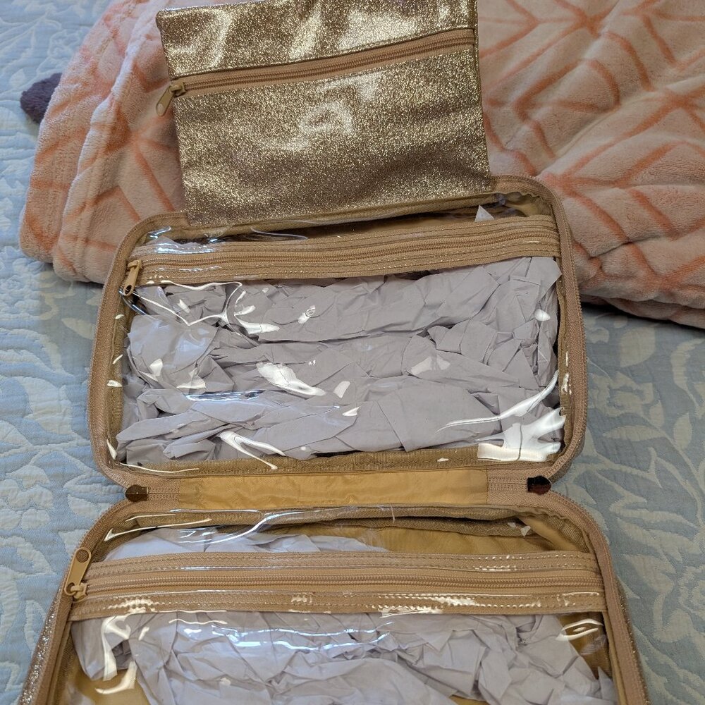 Two pairs sz M slippers and makeup case.